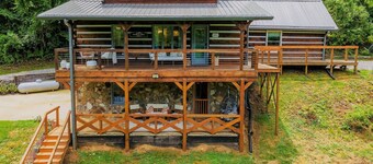 Cozy Boho Log Cabin 20 mins to AVL with Hot tub-Game room-Creek-Firepit-Hammock