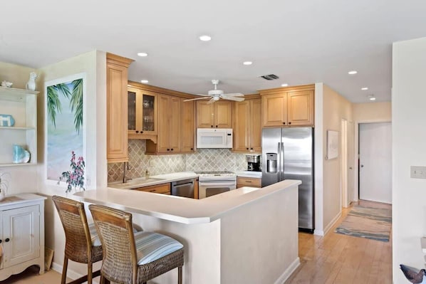 Fridge, microwave, oven, stovetop - Gorgeous Oceanfront Residence at Sunset South (Sanibel)