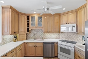 Fridge, microwave, oven, stovetop - Gorgeous Oceanfront Residence at Sunset South (Sanibel)