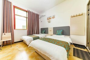 A hotel room with two beds, a chair, a window with curtains, an air conditioning unit, and a wall-mounted coat rack. - Huashan - Loft Youth Mountain Residence (Huayin)