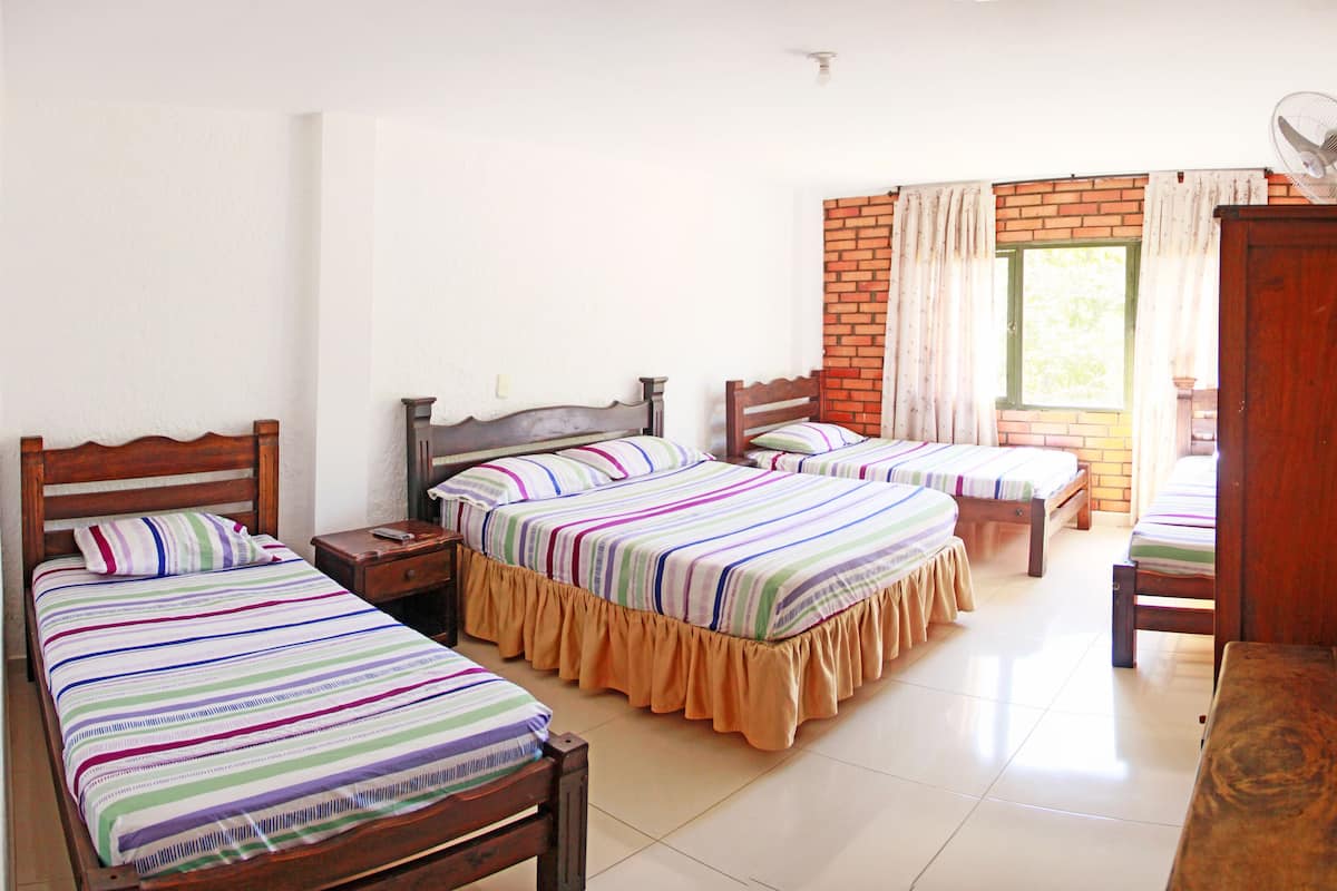Family Room | 1 bedroom, in-room safe, free WiFi, bed sheets