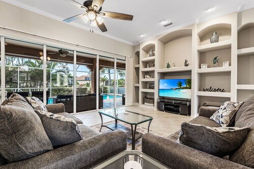 Western Exposure on cul-de-sac with spill over spa pool & boat dock. SUNSETS!