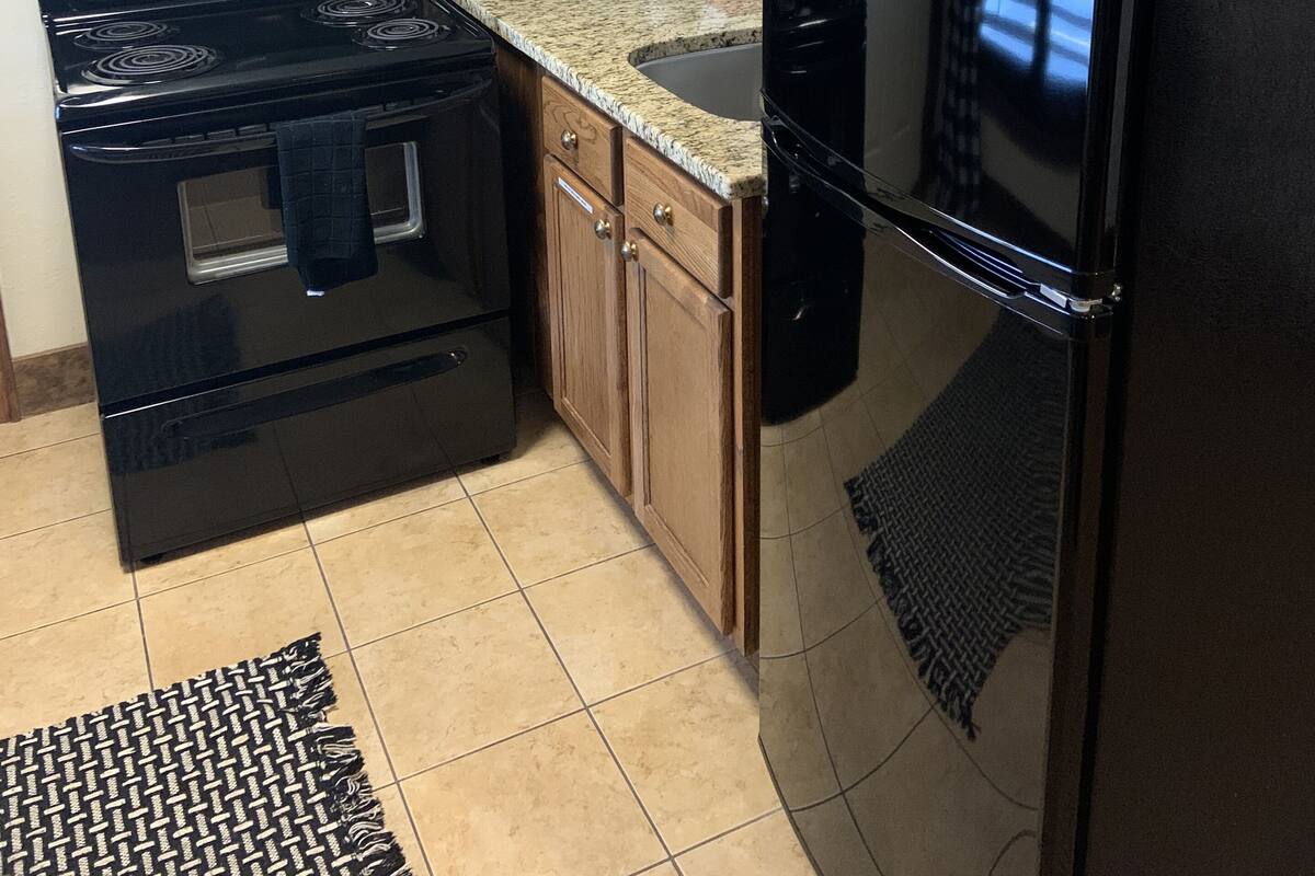 Family Apartment | Living area | 35-inch LCD TV with cable channels, TV