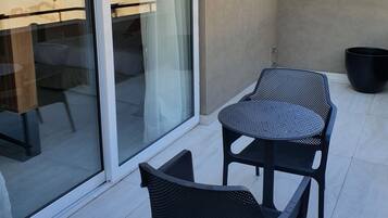 Suite superior, 1 cama de matrimonio grande, no fumadores | Terraza o patio