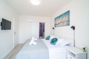 2 dormitorios, tabla de planchar con plancha, wifi y ropa de cama