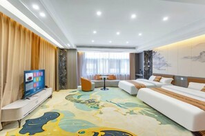 A hotel room with a sofa, a bed, a TV, and a small table. - Pingyi to This Inn Travel Inn (Pingyi)
