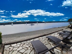 On the beach, sun-loungers, beach towels