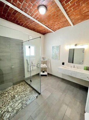 Shower, hair dryer, towels, soap