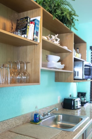Fridge, microwave, coffee/tea maker, toaster