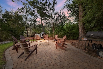 Enjoy a fun evening with family and friends around the wood burning firepit!