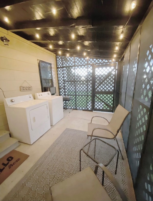 Convenient laundry facilities with a washing machine and dryer.