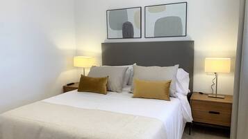 Coffres-forts dans les chambres, fer et planche Ă repasser