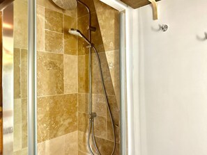 Shower, free toiletries, hair dryer, towels