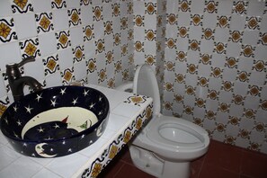 Regadera y toallas