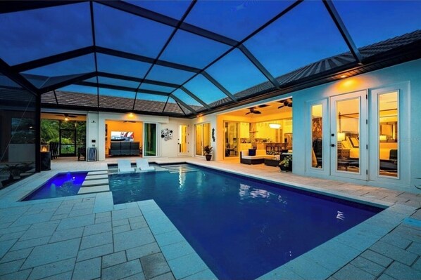 Outdoor pool, a heated pool, pool loungers