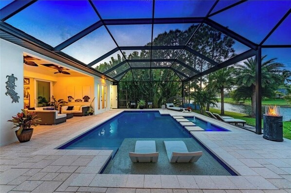 Outdoor pool, a heated pool, pool loungers