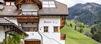 Bolser Apartment Piz da Peres" avec vue sur les montagnes, jardin et Wi-Fi.