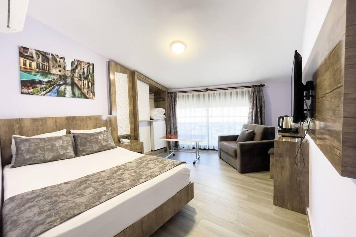 Egyptian cotton sheets, premium bedding, laptop workspace