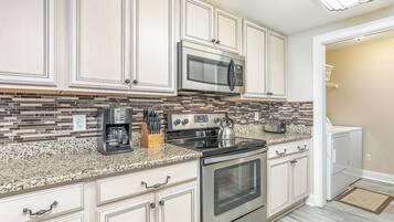 Condo, Multiple Beds, Kitchen, Ocean View (#107 - No Pets) | Private kitchen | Fridge, microwave, oven, stovetop