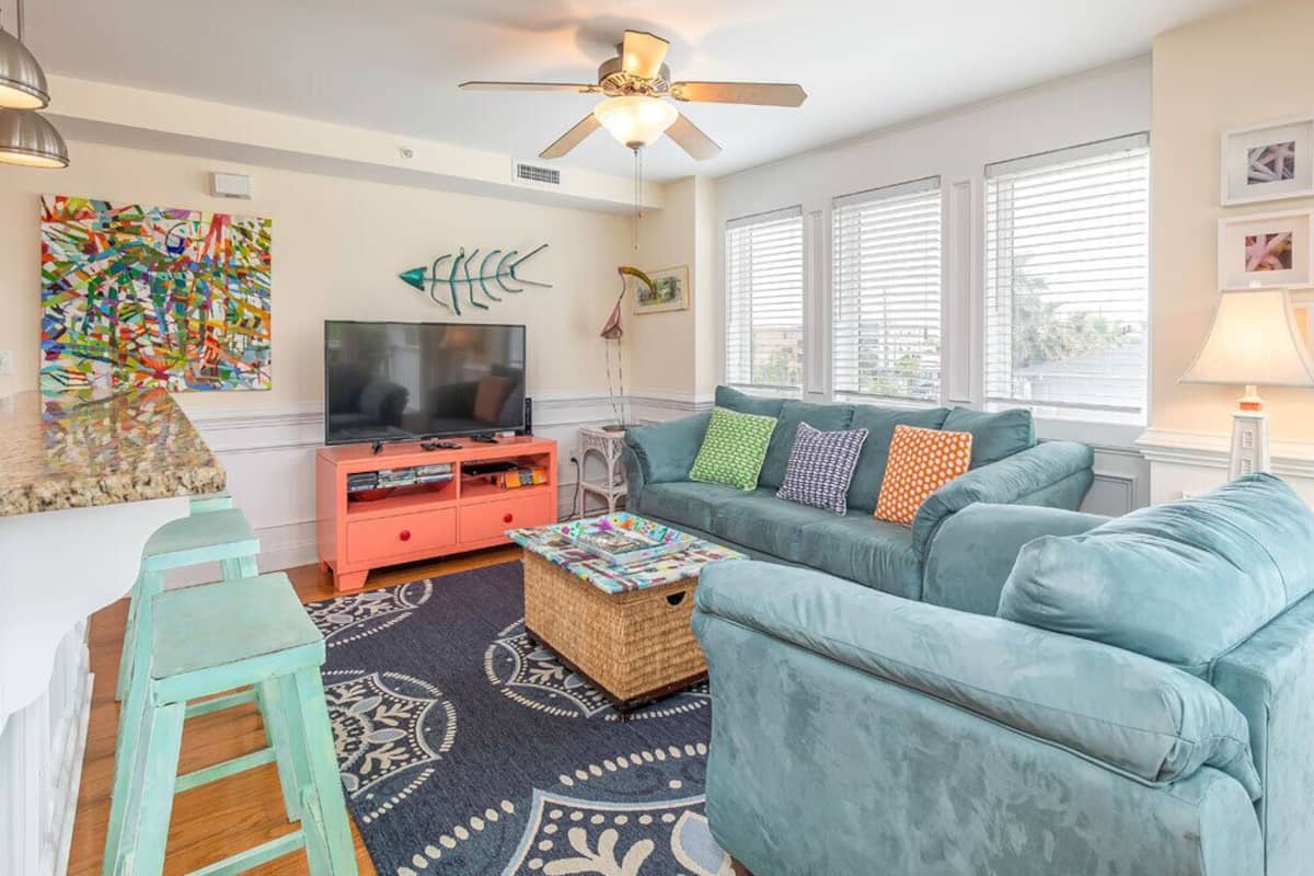 Condo, Multiple Beds, Pool Access, Garden View (Captains Watch 9 - No Pets Allowed) | Living area | 42-inch flat-screen TV with digital channels, TV