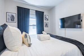 4 bedrooms, premium bedding, in-room safe, desk