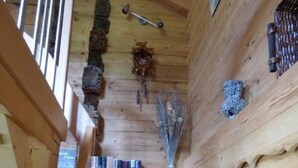A wooden staircase with red steps leading to a higher level. - Ground floor, parking, tv, 62m², Arêches-Beaufort (Beaufort)