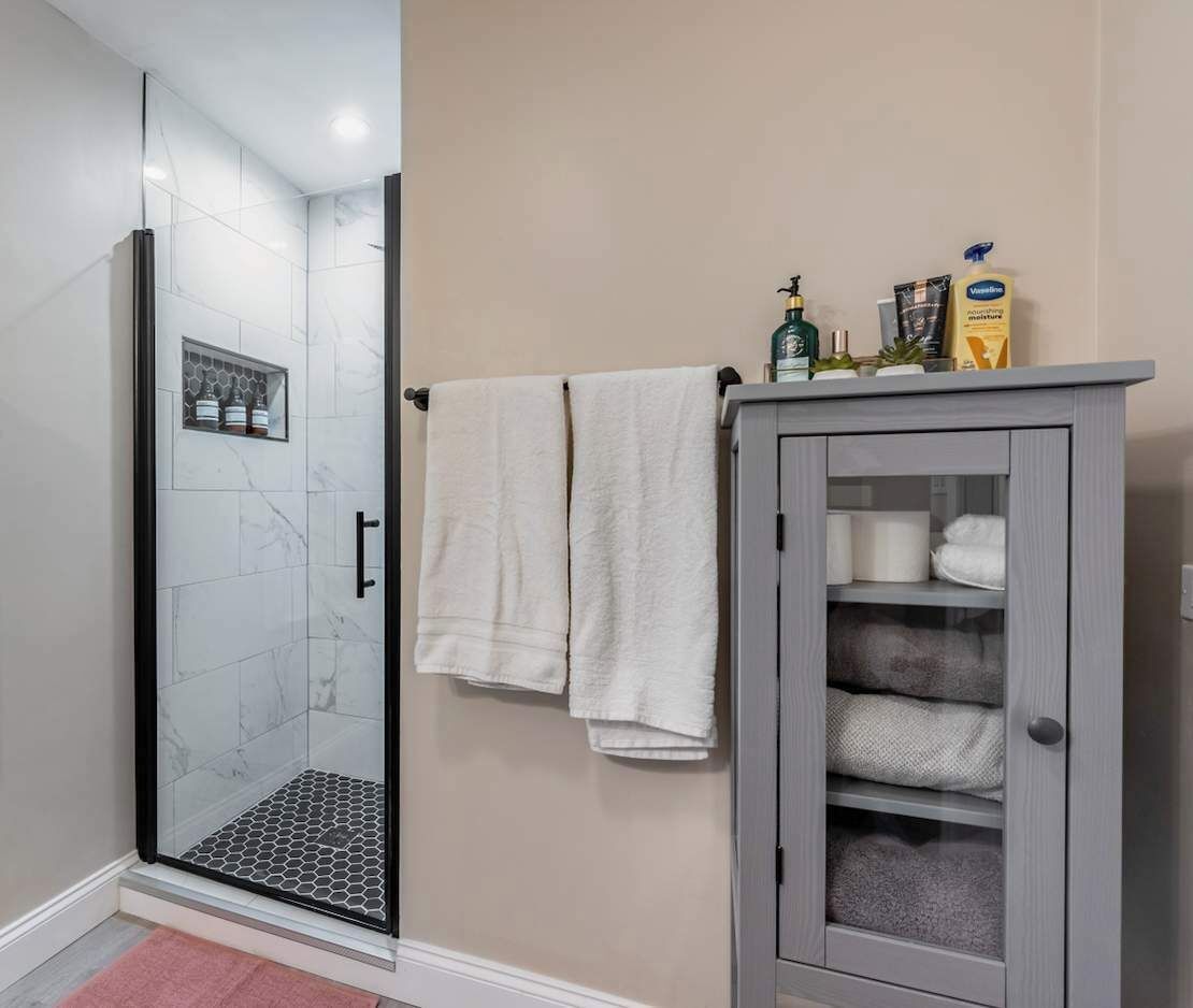 Bathtub, hair dryer, towels
