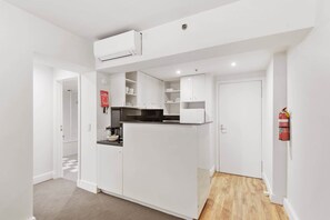 Fridge, microwave, oven, stovetop - Chic 1-Bed Apartment Steps From Shopping Street (South Yarra)
