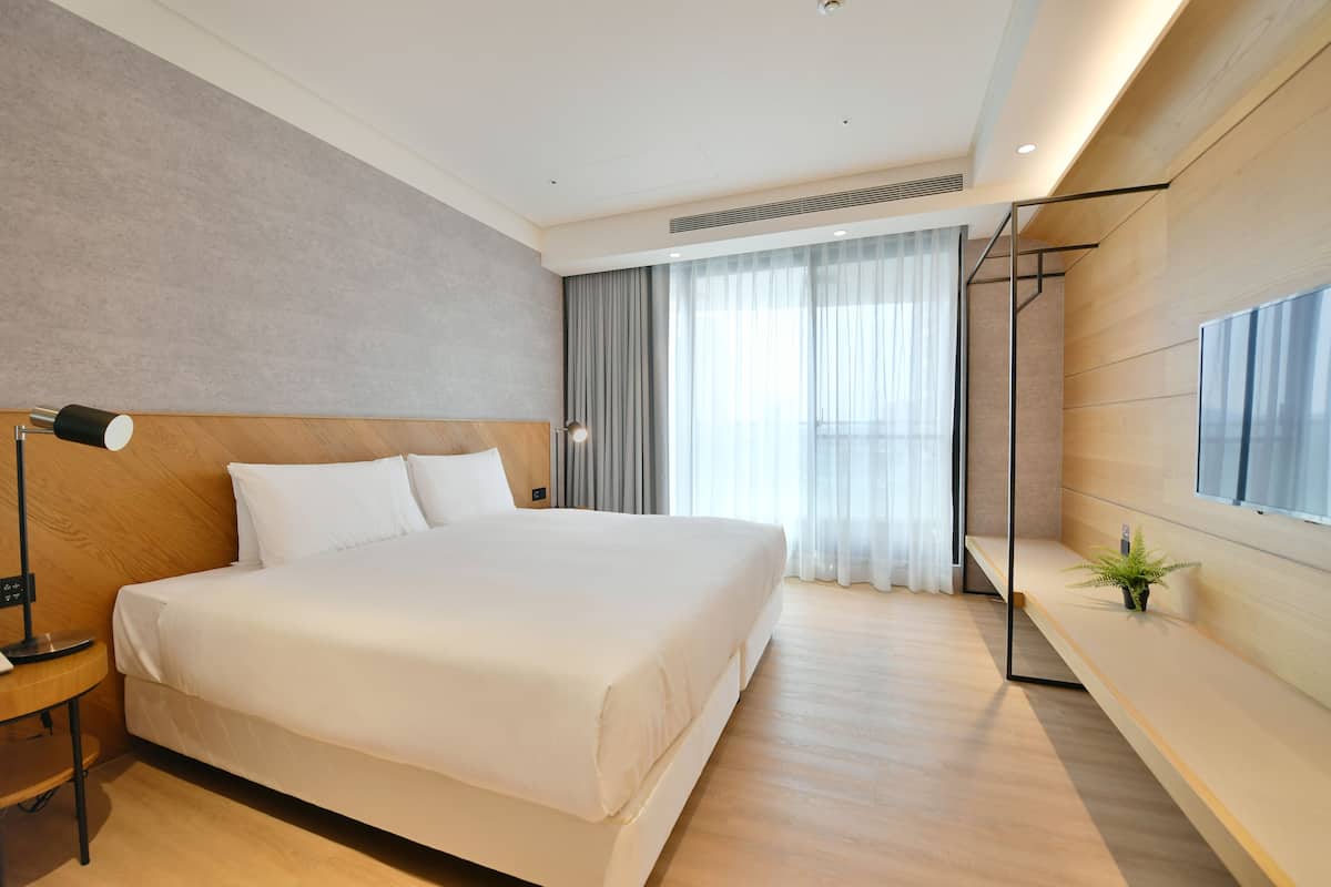 Habitación doble Deluxe | Escritorio, insonorización, wifi gratis y ropa de cama