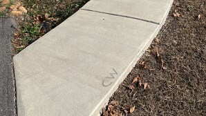 A concrete pathway leading to a wooden deck with stairs. - 2 BR,1BA Spacious Mountain View Suite near Cherokee National Forest, Ocoee River (Benton)