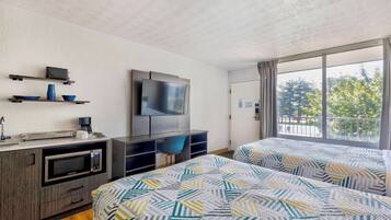 Desk, laptop workspace, blackout curtains, free WiFi