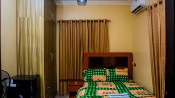 1 bedroom, desk, iron/ironing board, bed sheets