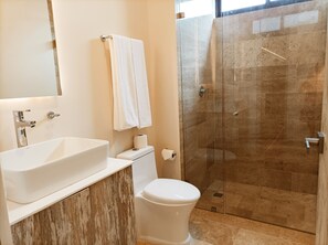 Apartment | Bathroom | Shower, rainfall showerhead, hair dryer, towels - ELLE Studio (Tulum)