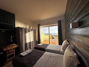 Comfort Room | Desk, laptop workspace, bed sheets