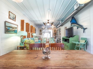 Enjoy a romantic dinner for two in this charming dining area, complete with a nautical theme and a beautifully designed ceiling.