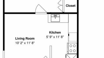 Plano de planta que muestra un dormitorio, sala de estar, cocina, baño y un solario.