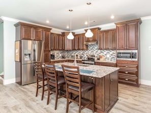 House, Multiple Beds, Pool Access, Pool View | Private kitchen | Fridge, microwave, oven, stovetop - Casa Azul by Tybee Vacation Rentals (Tybee Island)