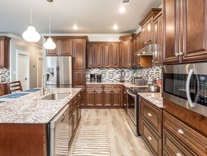 House, Multiple Beds, Pool Access, Pool View | Private kitchen | Fridge, microwave, oven, stovetop - Casa Azul by Tybee Vacation Rentals (Tybee Island)