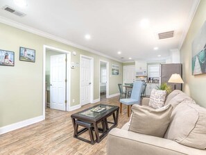 Condo, Multiple Beds, Kitchen, Garden View | Living area | TV - Dune A by Tybee Vacation Rentals (Tybee Island)