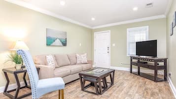 Condo, Multiple Beds, Kitchen, Garden View | Living area | TV