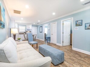 House, Multiple Beds, Kitchen, Partial Ocean View | Living area | TV - Dune Villa by Tybee Vacation Rentals (Tybee Island)