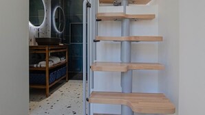 A staircase with wooden steps and a metal railing. - The TM House - The Dovecote (DOSCHES)