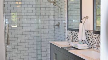 Combined shower/tub, hair dryer, towels, soap