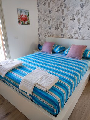 2 dormitorios, tabla de planchar con plancha, wifi gratis y ropa de cama