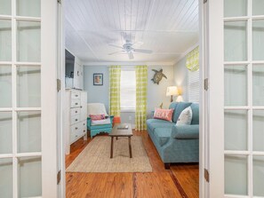 House, Multiple Beds, Kitchen, Garden View | Living area | 42-inch flat-screen TV with digital channels - Mellow Yellow by Tybee Vacation Rentals (Tybee Island)