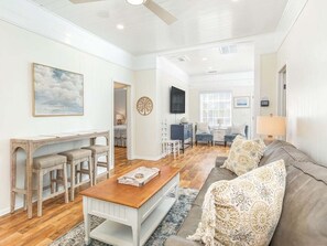 House, Multiple Beds, Kitchen, Garden View | Living area | TV, fireplace, table tennis - Mullet Manor by Tybee Vacation Rentals (Tybee Island)