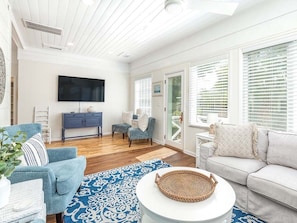 House, Multiple Beds, Kitchen, Garden View | Living area | TV, fireplace, table tennis - Mullet Manor by Tybee Vacation Rentals (Tybee Island)