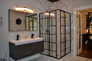 Bathtub, hair dryer, towels, soap
