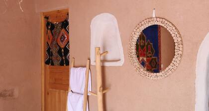 BEDROOM with private terrace in a farmhouse in the heart of the palm grove