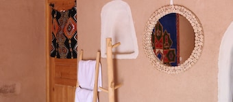 BEDROOM with private terrace in a farmhouse in the heart of the palm grove